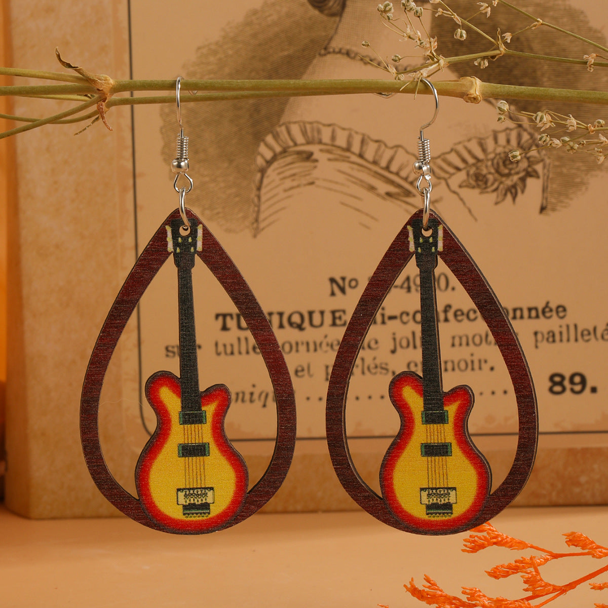 Guitarra de agua de agua al por mayor arpa acordeón estampado de madera aretes de madera